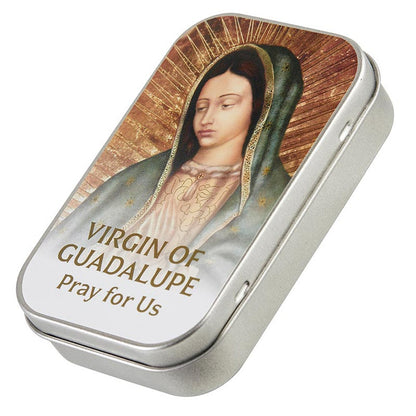 Silver prayer box featuring Virgin of Guadalupe image with "Pray for Us" text, includes paper and pencil for petitions