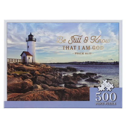 500-piece jigsaw puzzle featuring a lighthouse on rocky shore with Psalm 46:10 “Be Still & Know That I Am God” text