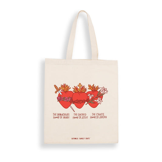 Natural cotton canvas tote bag with red Sacred Hearts of Mary, Jesus, and Joseph illustrations and text