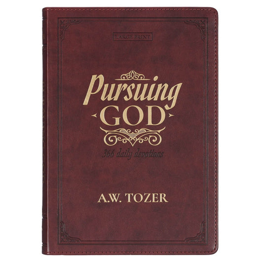 Pursuing God large print devotional book in saddle tan faux leather with gold embossed title and decorative border