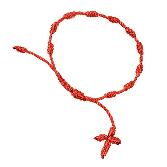Red knotted cord rosary bracelet with small knots forming beads and a knotted cross, lightweight and wearable for daily prayer.