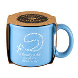 13 oz light blue ceramic mug with white rosary design and "A Rosary a day keeps the key of life" text on front