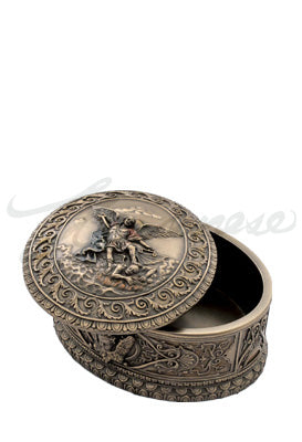 4 3/4" oval bronze keepsake box with detailed Saint Michael relief and ornate decorative scrollwork design