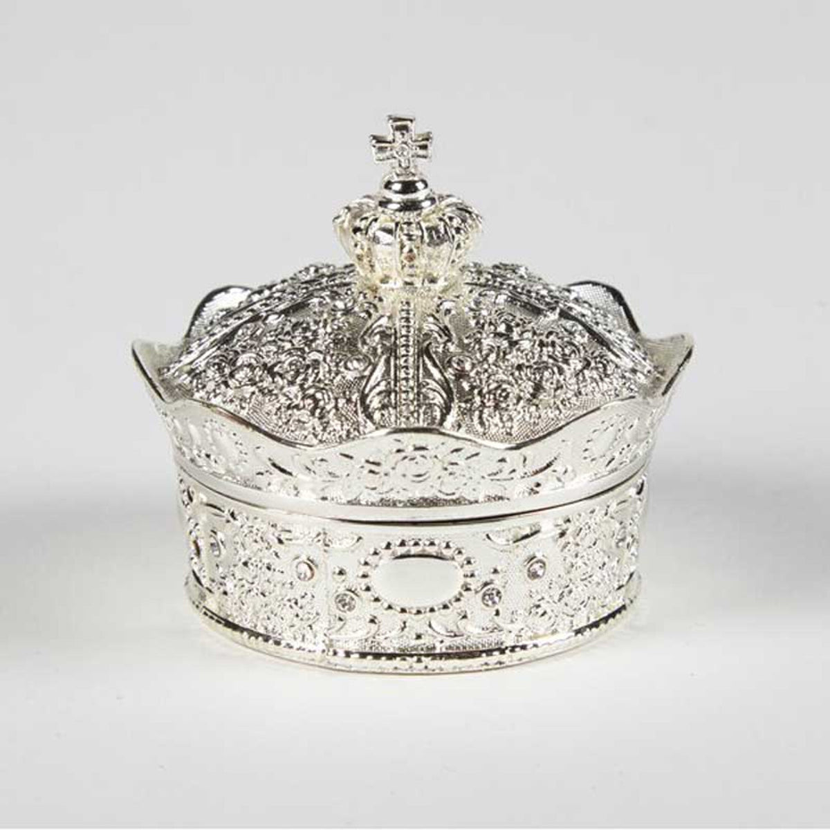 Silver crown box with detailed floral embossing, topped with ornate cross, designed to hold 13-piece Arras coin set for weddings