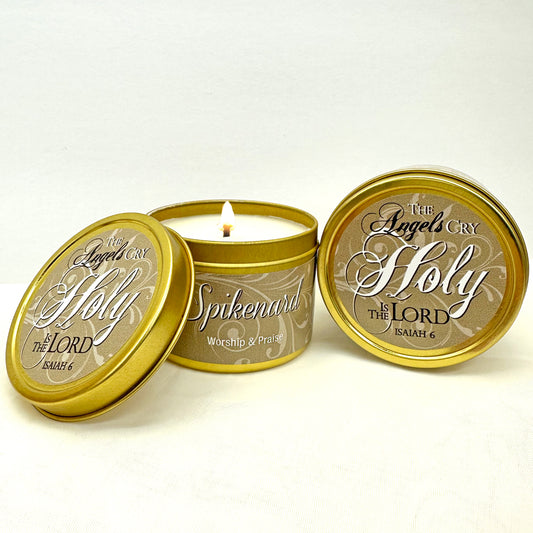 Spikenard scripture tin candle with gold lid, inscribed "The angels cry Holy is the Lord" with Isaiah 6:3 verse detail