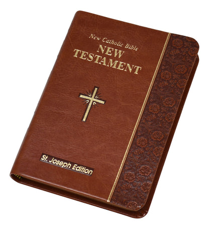 Compact St. Joseph Edition New Catholic Bible New Testament vest pocket edition with embossed floral design and gold cross emblem