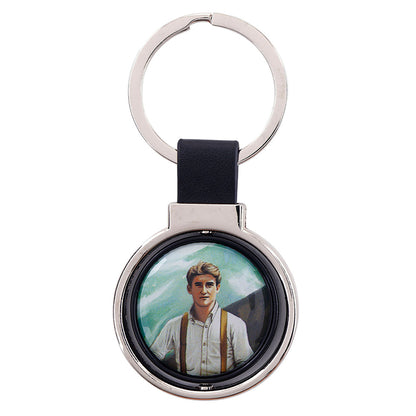 St. Pier Giorgio Frassati rotating keychain with detailed portrait and silver-tone metal frame and black leather strap