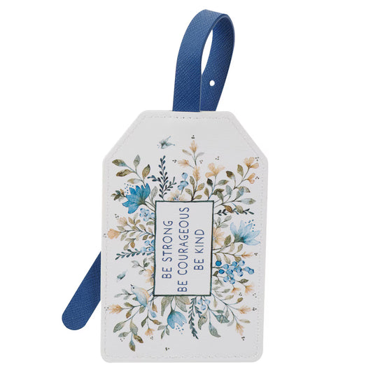 White faux leather luggage tag with blue strap and floral design featuring "Be Strong Be Courageous Be Kind" text in center