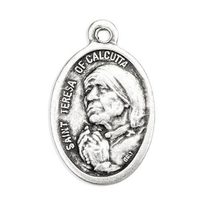 1" Saint Teresa of Calcutta oval oxidized silver medal with detailed relief and "Pray for Us" inscription on back, made in Italy
