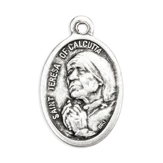 1" Saint Teresa of Calcutta oval oxidized silver medal with detailed relief and "Pray for Us" inscription on back, made in Italy