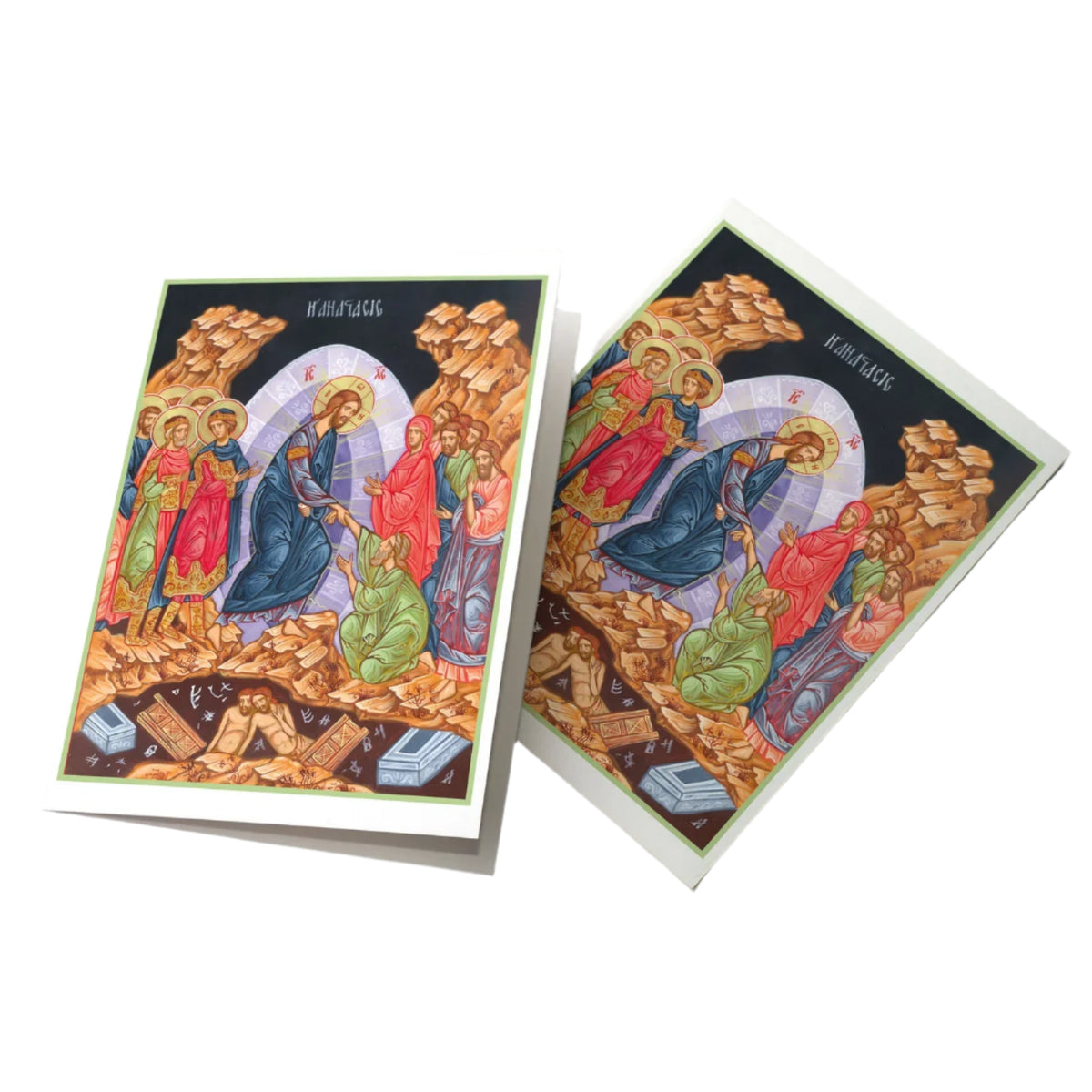 Easter card featuring hand-illustrated religious scene of Christ’s resurrection with vibrant colors on white folded card