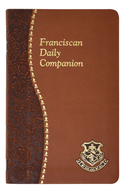 Brown and dark brown Franciscan Daily Companion book cover with gold embossed title and emblem on front