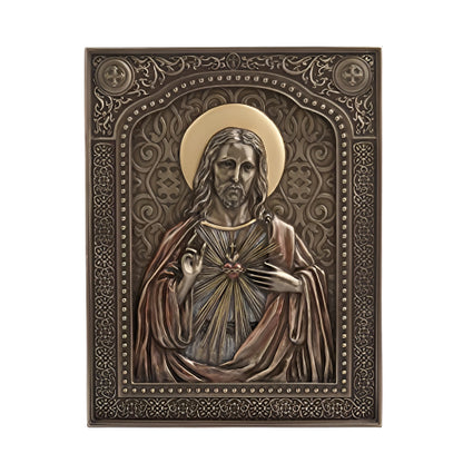 7 1/2" Sacred Heart of Jesus resin wall plaque with bronze finish and detailed ornamental border design