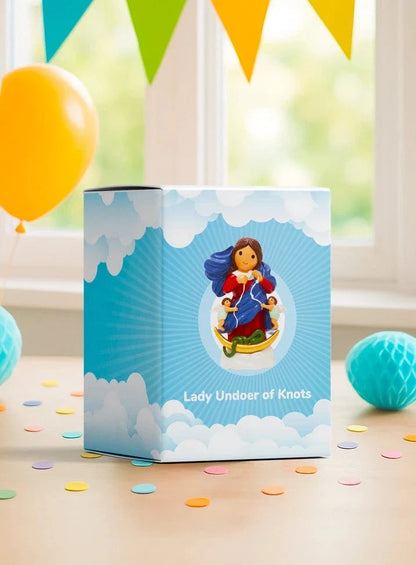 Blue and white box packaging for Our Lady Undoer of Knots Collector's Edition 3.5 inch figurine with cloud design