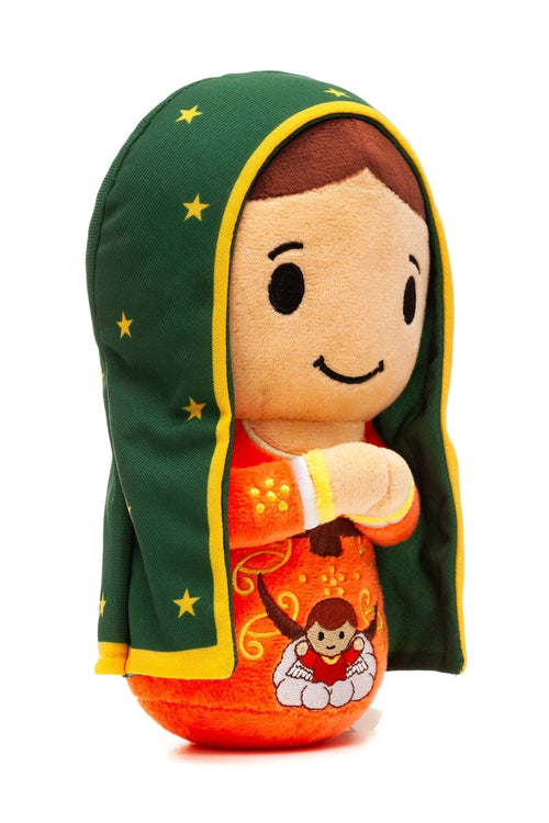 9" plush doll of Our Lady of Guadalupe with green cloak, yellow stars, and embroidered prayer design on orange robe