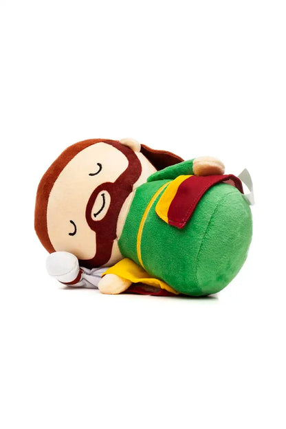 Sleeping Saint Joseph plush doll in green and yellow robe lying on its side on white background