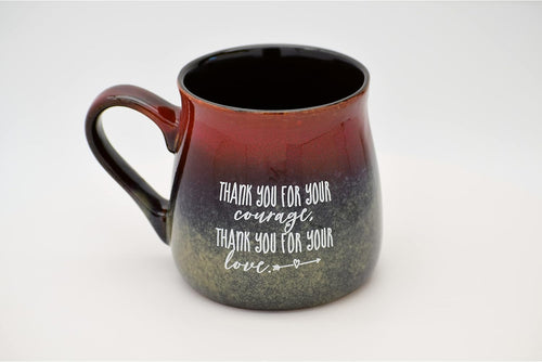 Ceramic "Thank You for Your Courage, Thank You for Your Love" mug with red and black reactive glaze finish.