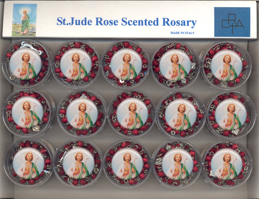 Display of 15 Italian-made St. Jude rose scented rosaries with detailed red beads and saint image centerpiece