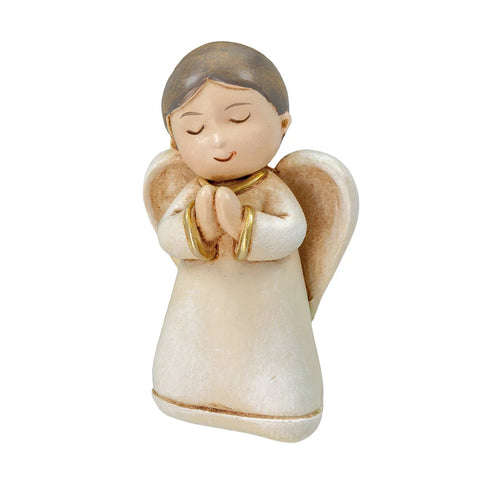 Small ceramic angel figurine with closed eyes, praying hands, gold trim, and textured wings on white background.